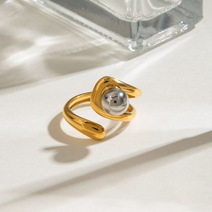 Bague Coda Swirl Statement – Anneau sculpté enveloppant en acier inoxydable bicolore et imperméable