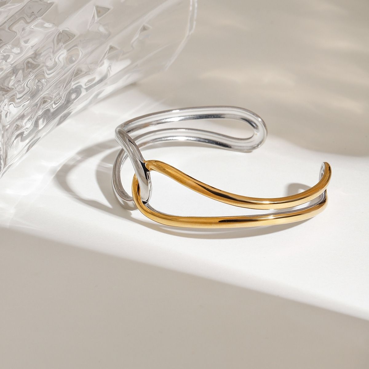 Bracelet manchette Interlock – Jonc ouvert en fil d'acier inoxydable bicolore et imperméable