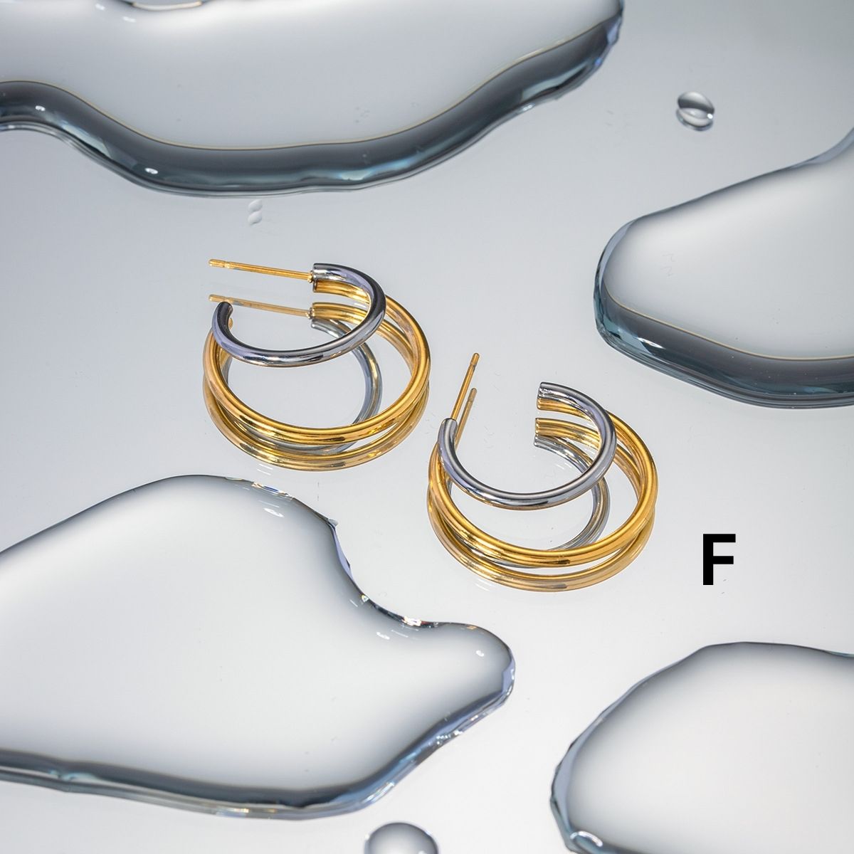 Boucles d'oreilles créoles Statement Duo – Créoles et huggies bicolores en acier inoxydable imperméable